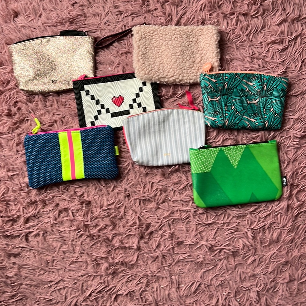 pack of 7 Ipsy makeup bags